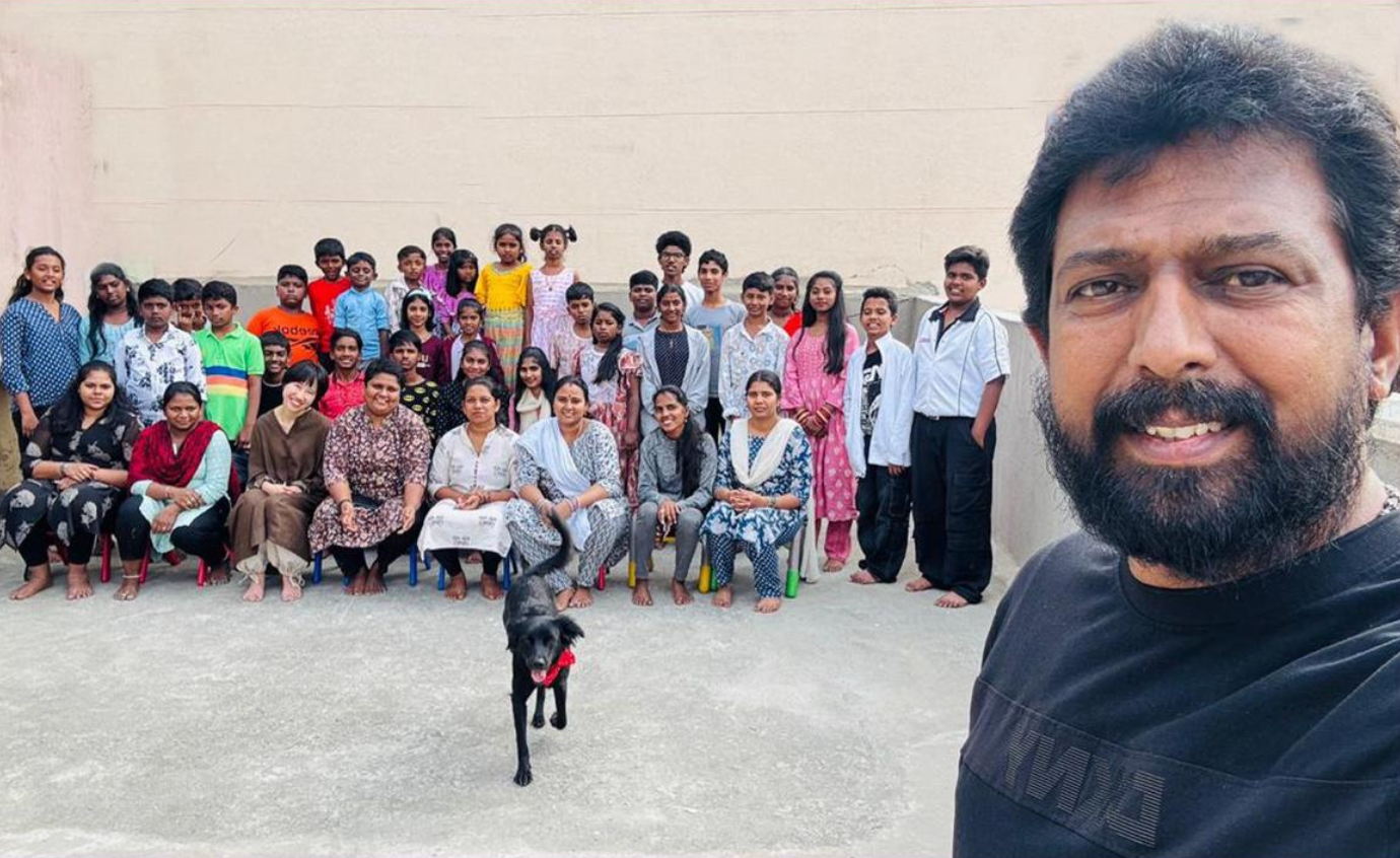 Smiling children at loving hearts in Bengaluru
